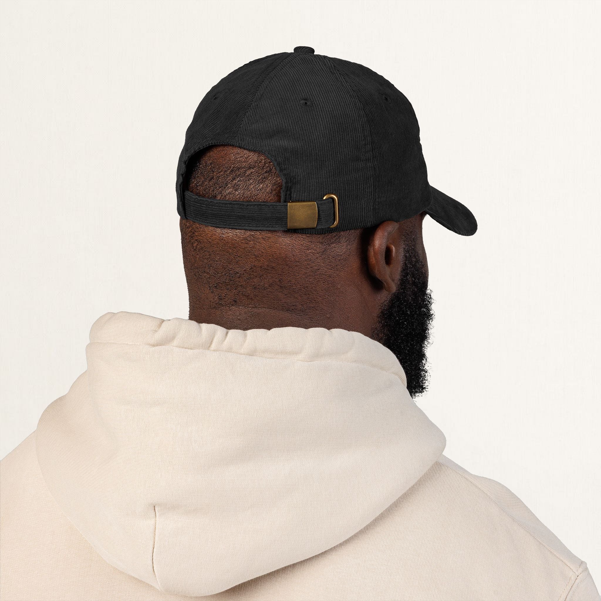 Close-up of DAD SINCE YEAR personalized off-white embroidery on black corduroy cap
